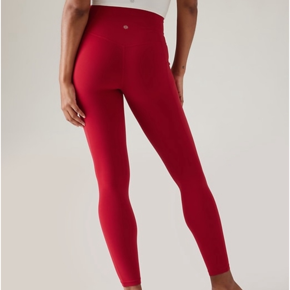 Athleta large tall salutation stash red leggings.